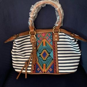 Navy and white striped purse. Colorful middle accent.